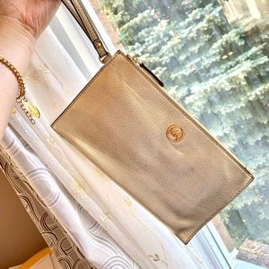 Michael Kors metallic gold wristlet